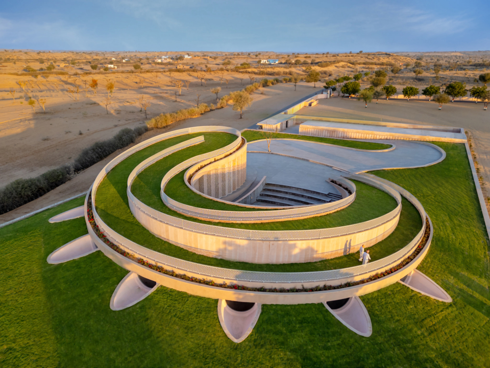 1 The southern side is protected by a grass covered earth berm to keep the inner spaces cool
